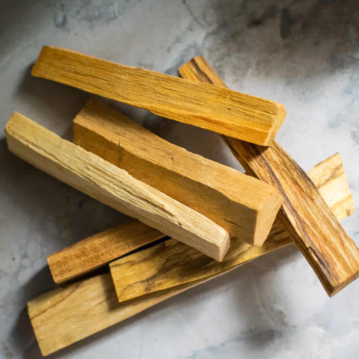 A pile of palo santo wood sticks.