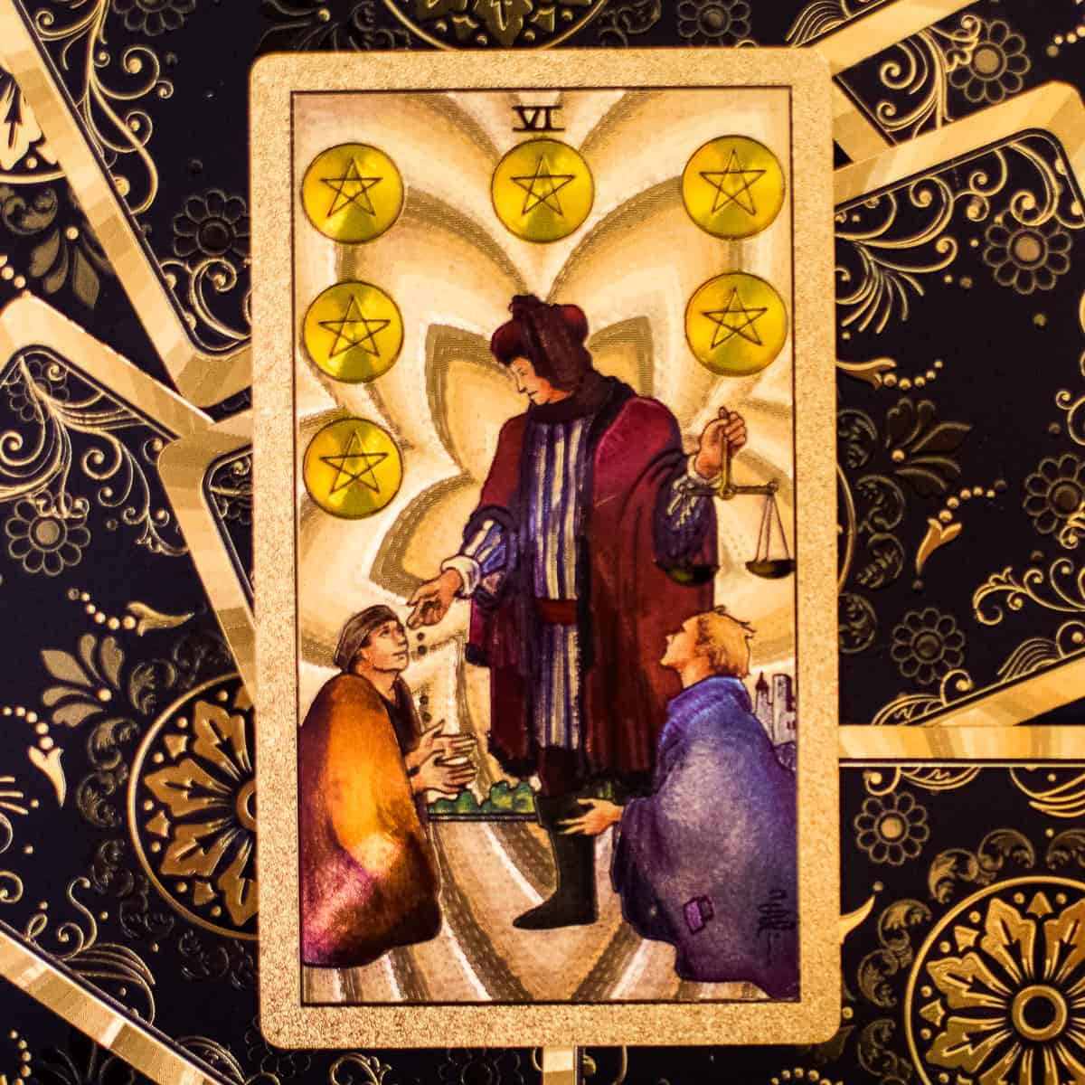 Man with scales equally dividing pentacles between two people depicted on a tarot card.