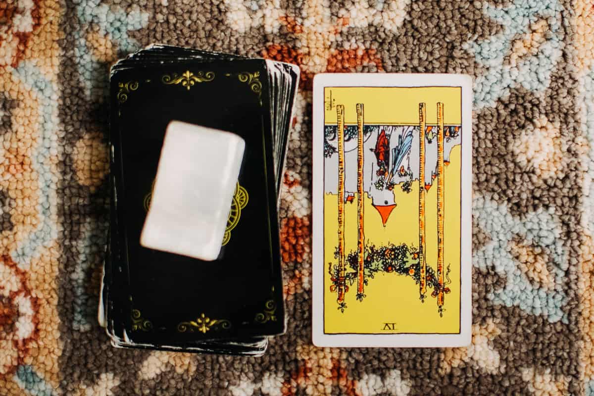 Four of Wands card in the reversed position. 