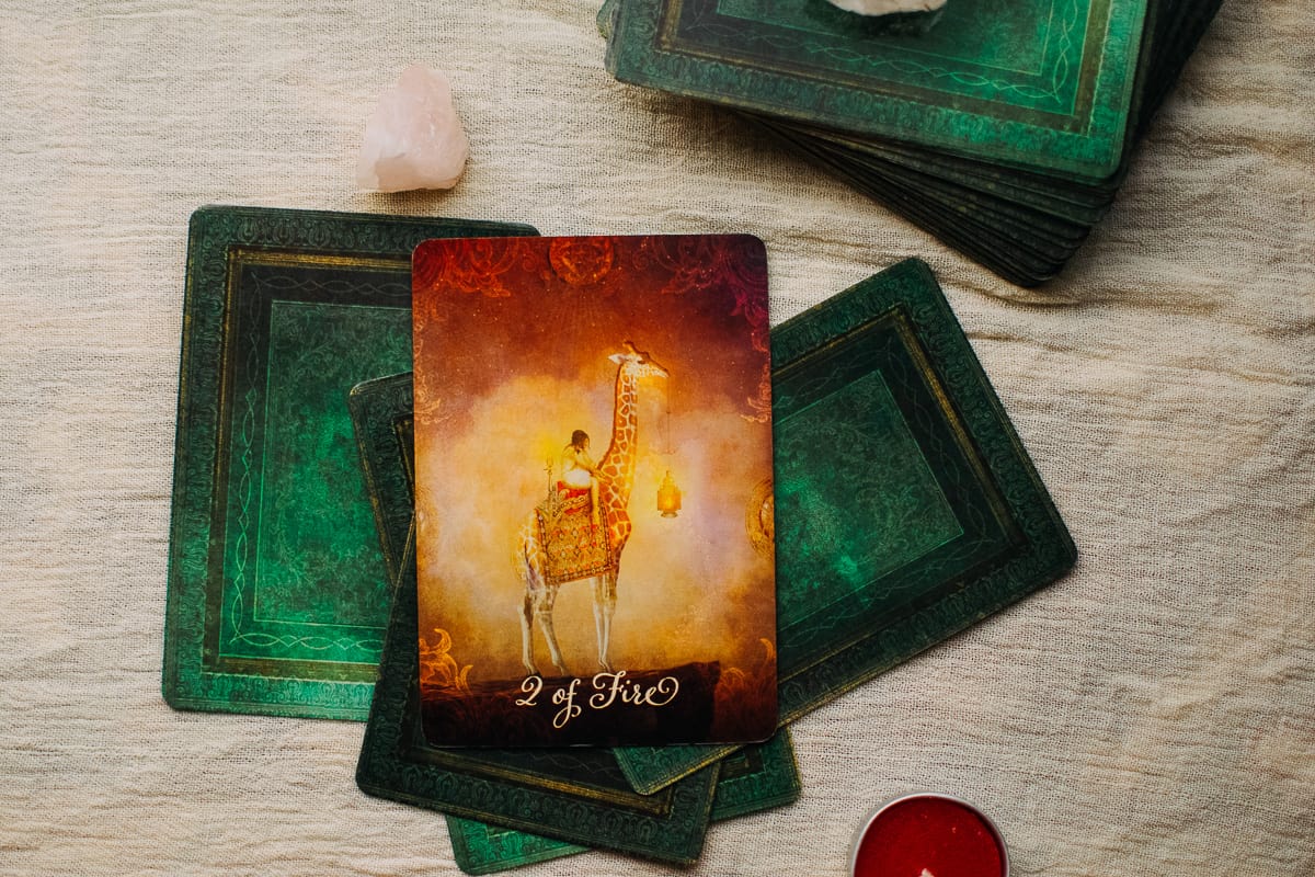 The Two of Fire card as depicted by The Good Tarot deck.